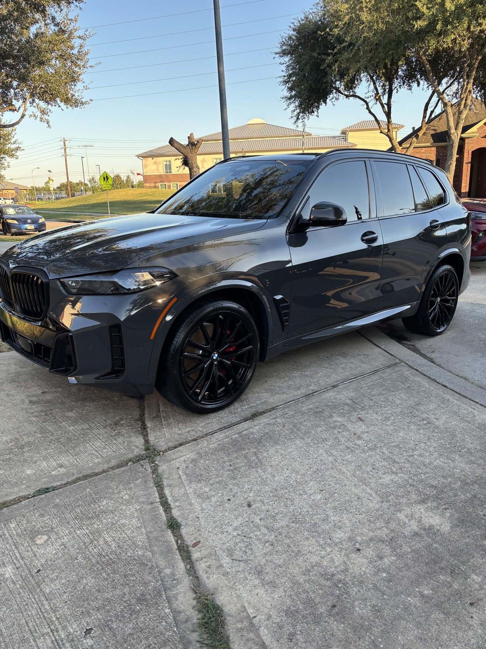 BMW X5 stealth look front three-quarter after detailing