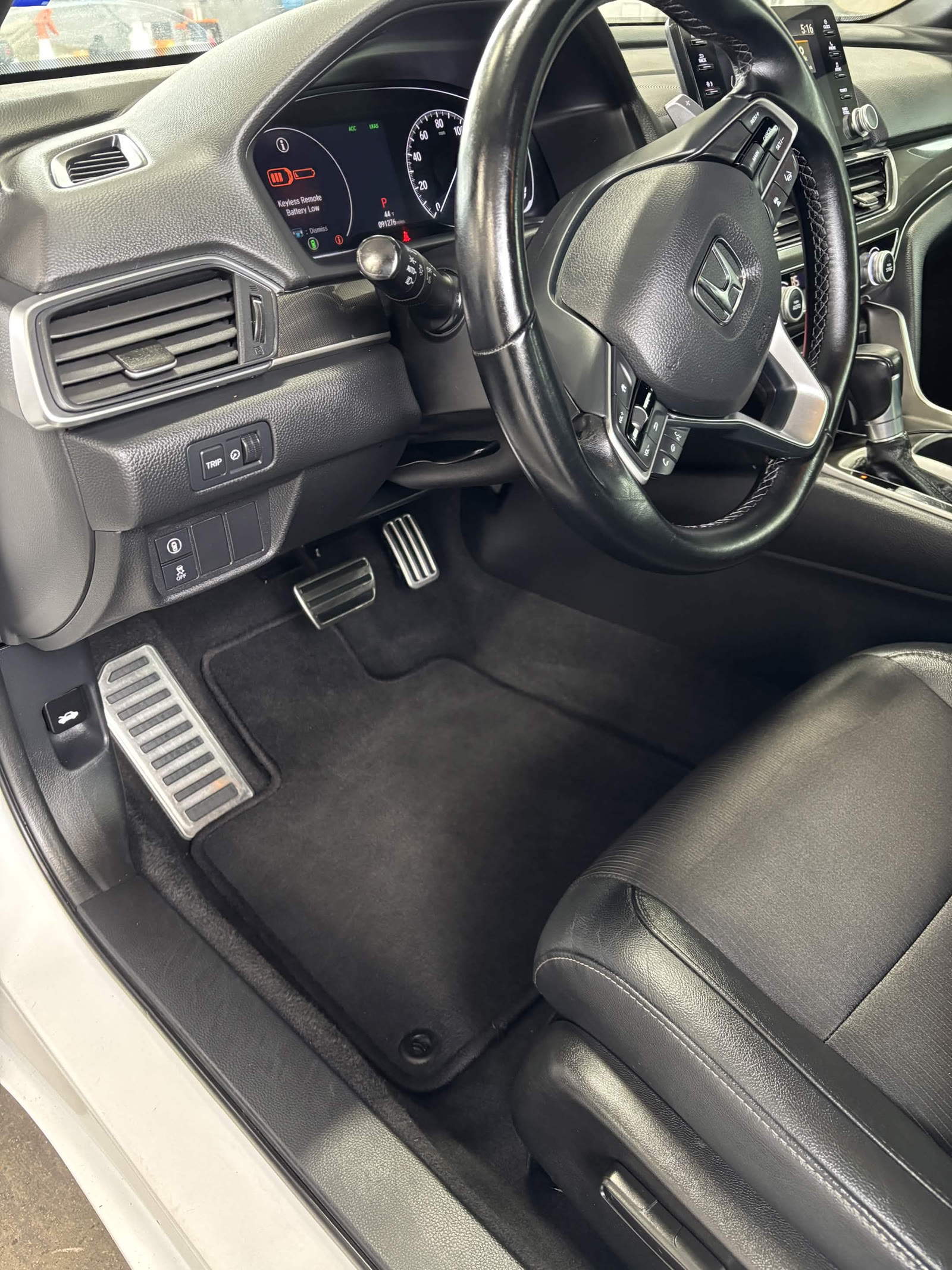 Honda driver footwell and pedals after interior detailing